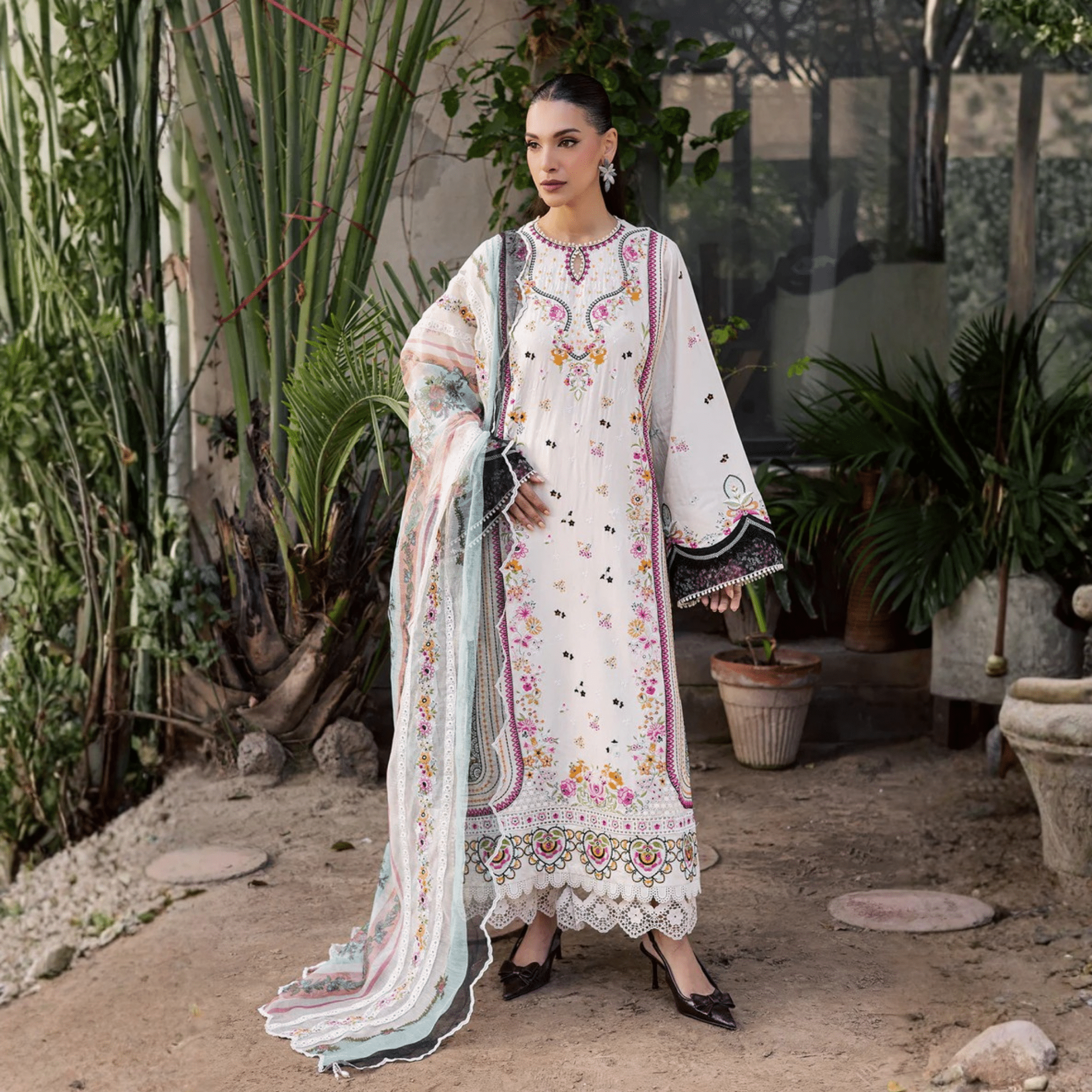 • Clothing: Embroidered/Printed suit for women - Made of best quality fabric - lawn or linen or chiffon - pure silk - Available at Najma Designs & Co. • Jewelry: Gold - plated stud earrings for