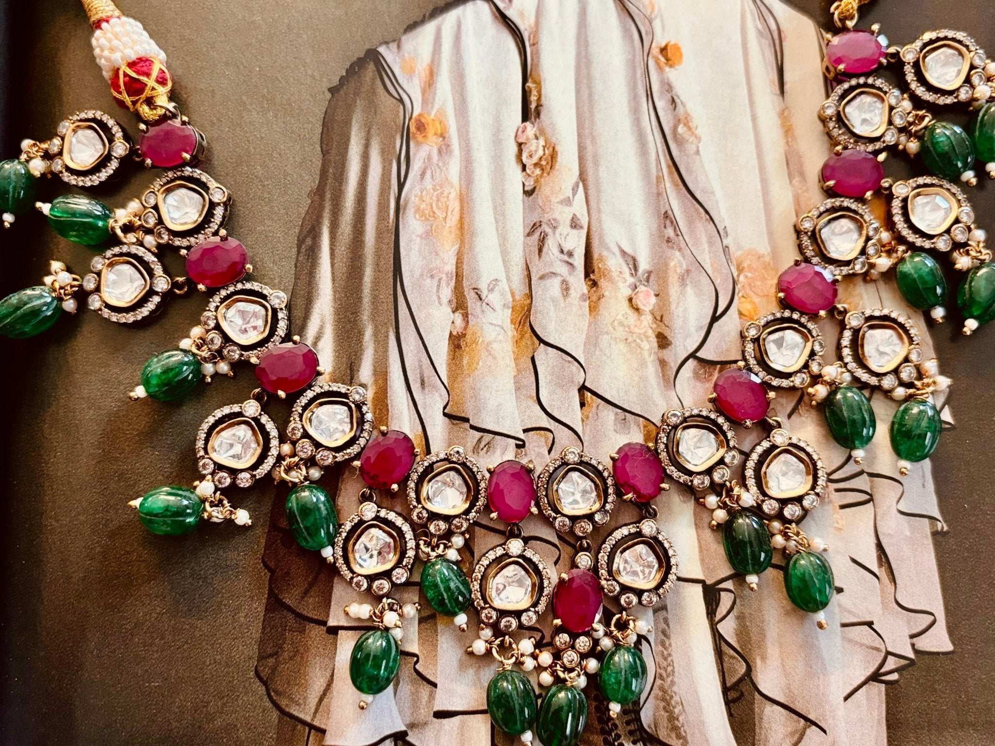 • Clothing: Embroidered/Printed suit for women - Made of best quality fabric - lawn or linen or chiffon - pure silk - Available at Najma Designs & Co. • Jewelry: Gold - plated stud earrings for