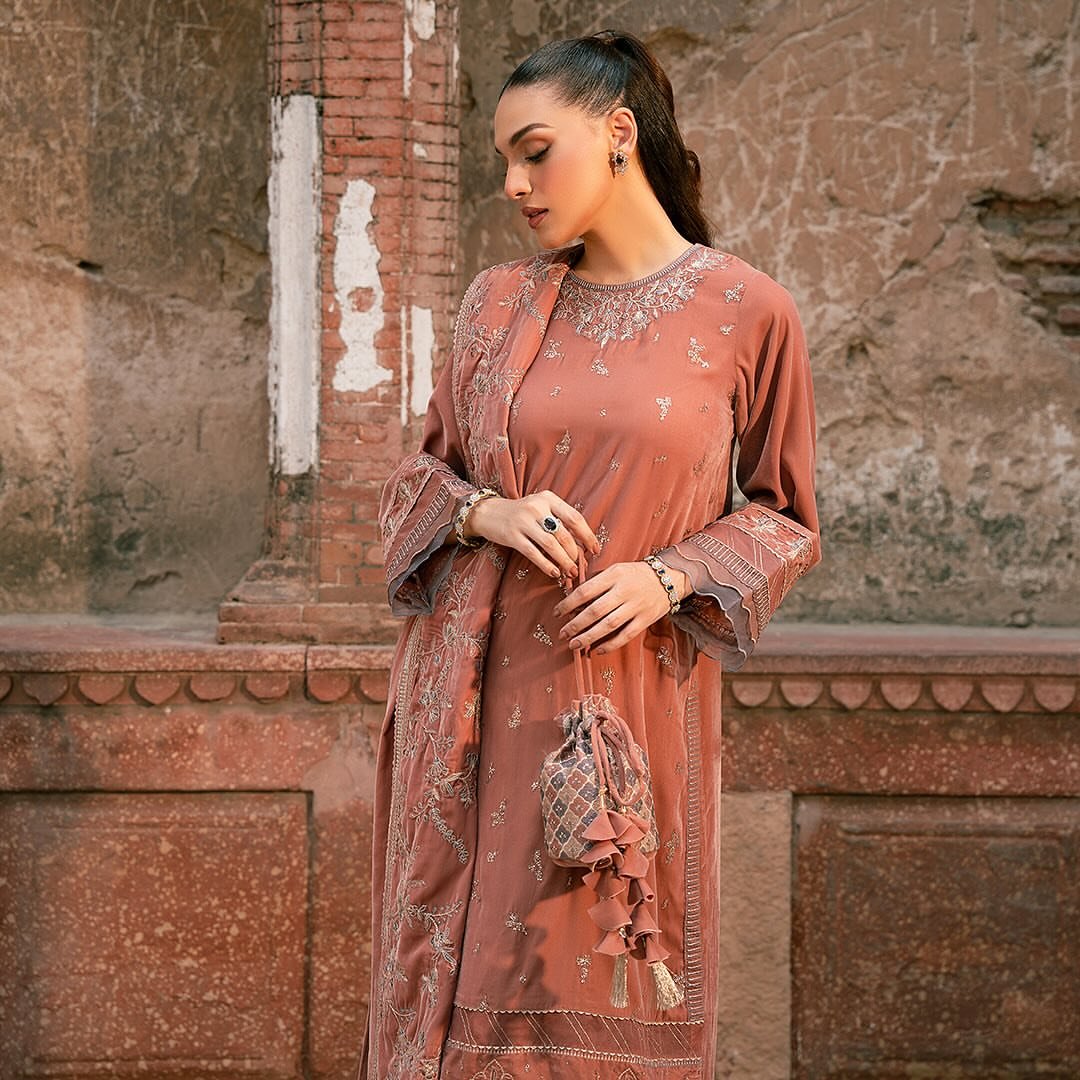 • Clothing: Embroidered/Printed suit for women - Made of best quality fabric - lawn or linen or chiffon - pure silk - Available at Najma Designs & Co. • Jewelry: Gold - plated stud earrings for