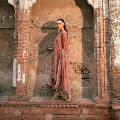 • Clothing: Embroidered/Printed suit for women - Made of best quality fabric - lawn or linen or chiffon - pure silk - Available at Najma Designs & Co. • Jewelry: Gold - plated stud earrings for