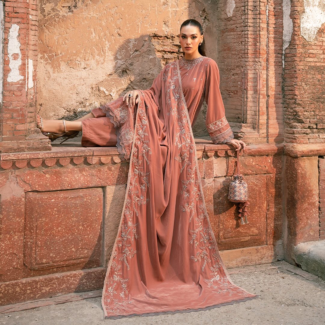 • Clothing: Embroidered/Printed suit for women - Made of best quality fabric - lawn or linen or chiffon - pure silk - Available at Najma Designs & Co. • Jewelry: Gold - plated stud earrings for